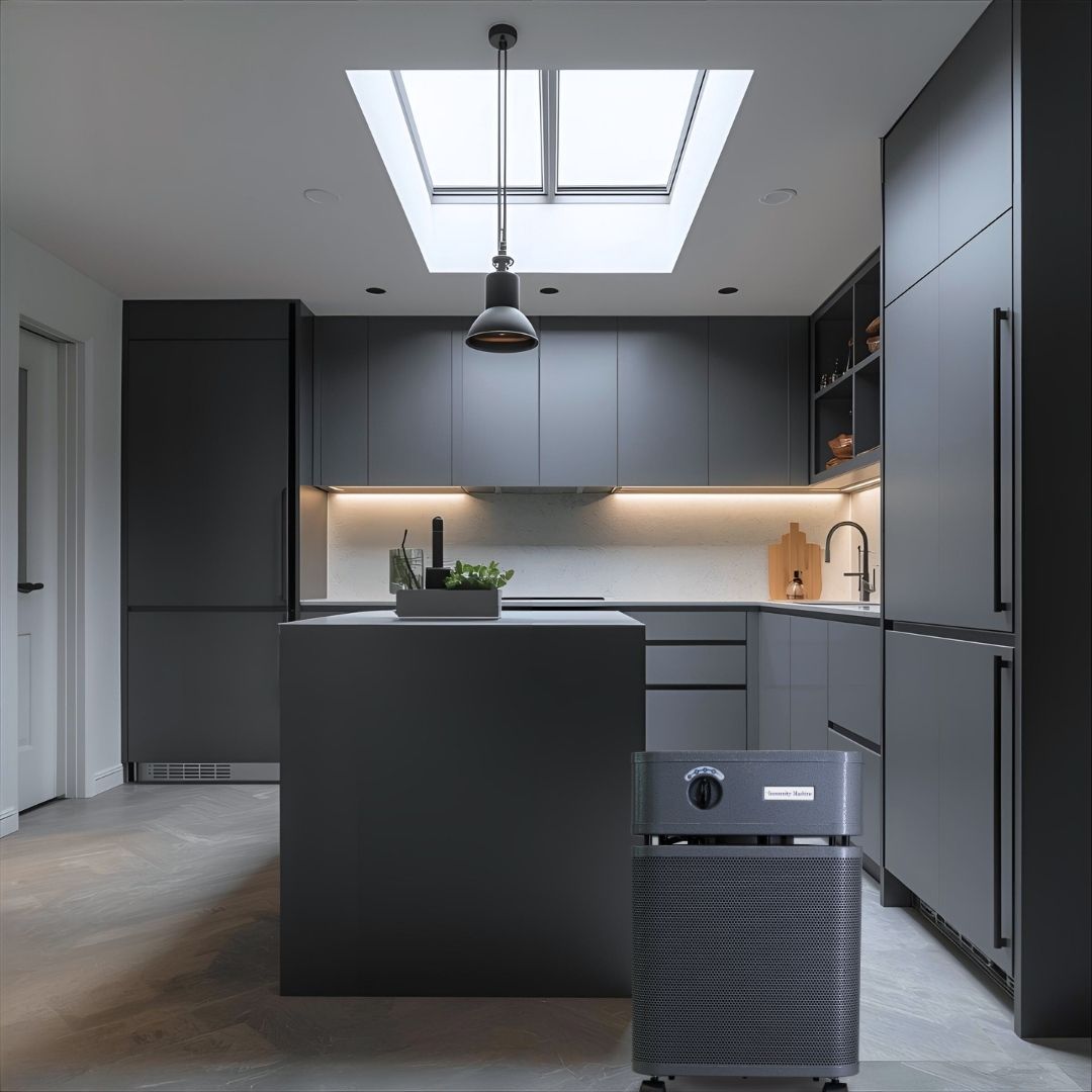 Modern kitchen with a central island and austin air immunity machine air purifier on the floor.