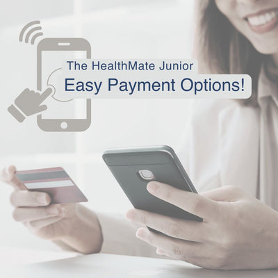 Person holding a smartphone and credit card with 'The HealthMate Junior Easy Payment Options!' text.