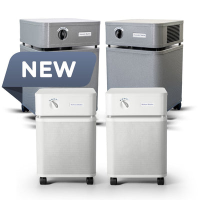 Four air purifiers of different sizes on a white background with 'NEW' label.
