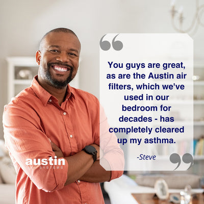 Man in an orange shirt with a testimonial about Austin air filters on a white background
