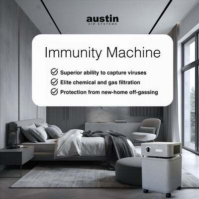 Air purifier labeled 'Immunity Machine' by Austin Air Systems in a modern bedroom.