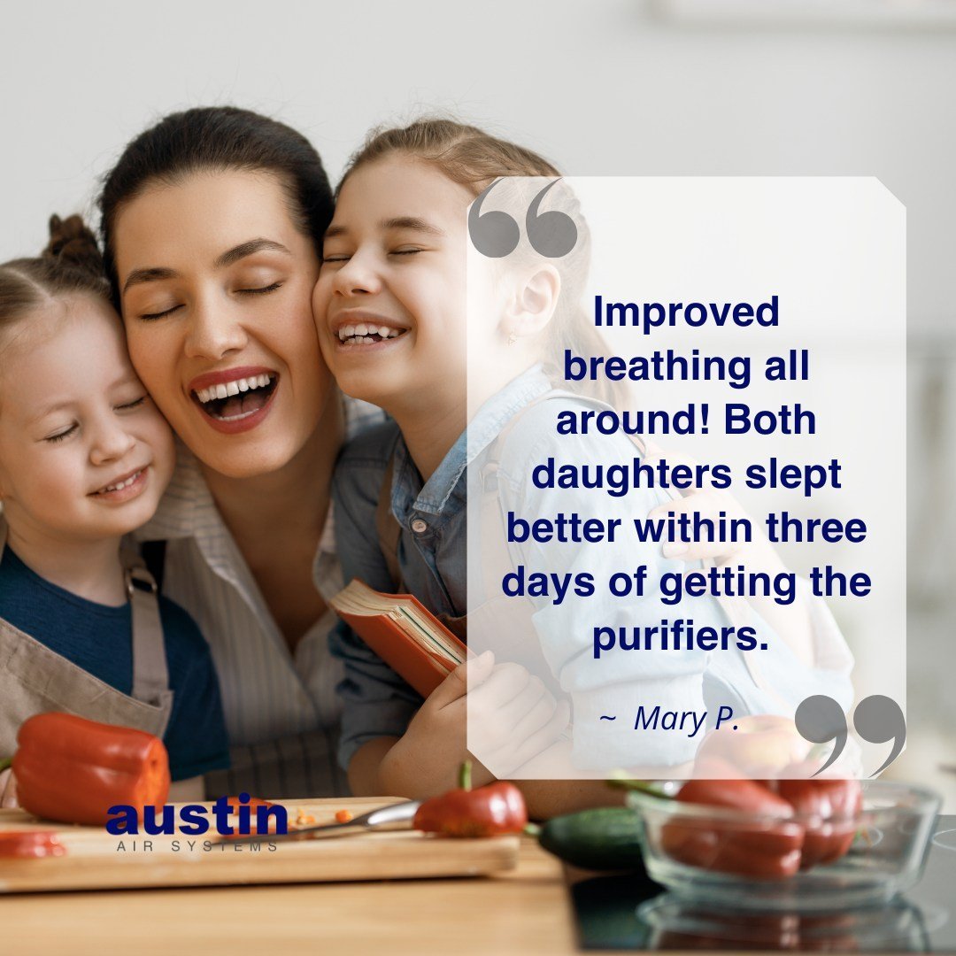 Woman and two children smiling, with a testimonial overlay about Austin Air purifiers.
